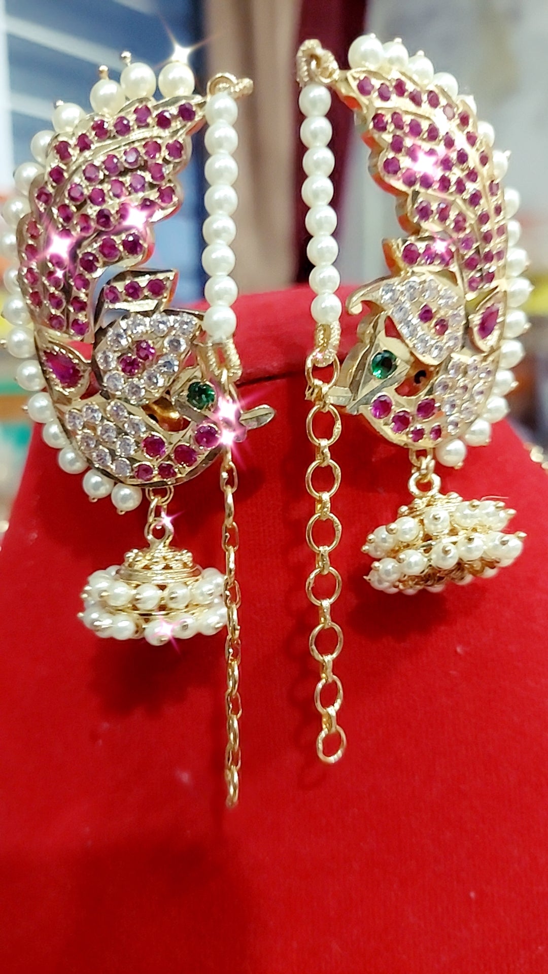 Peacock pearl earrings with attached mattal