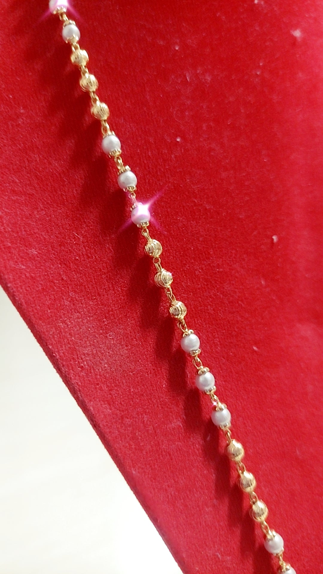 30 inches pearl beads with gold cappings