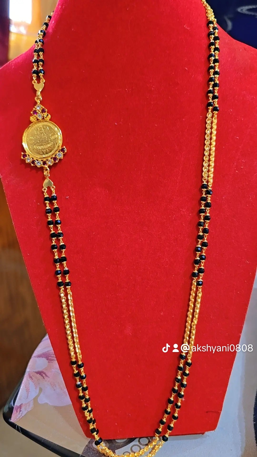 2 layer black beads . Length 30 inches. Not 916 gold. Function wear