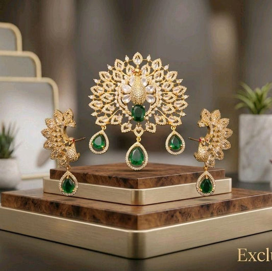 1.5 inch faux emerald embedded with white stones pendent 1.2 inch  earrings and pendent set. Chain not included