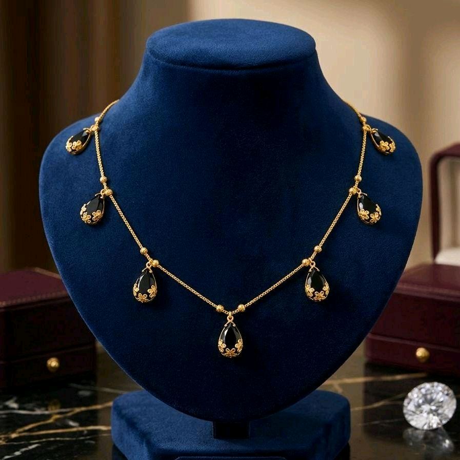 Black raindrops crystal necklace. Length 18 inches. Not 916 gold. Function wear type of jewellery