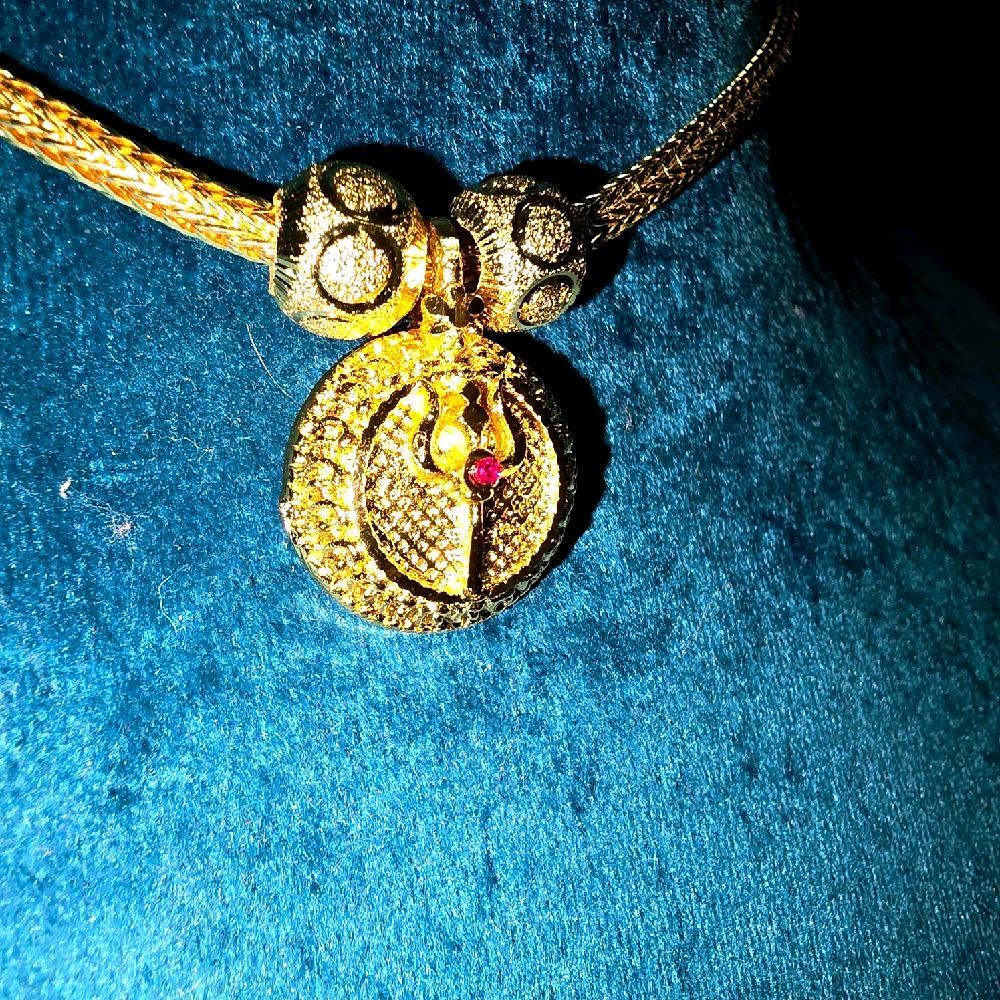 Removable trisul locket with ceylonese chain and diamond cut balls. Not 916 gold