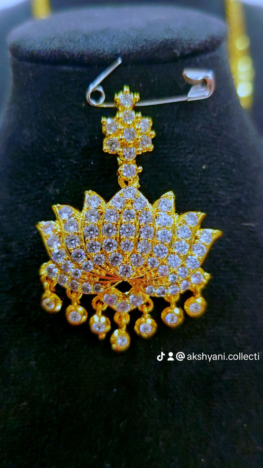 White lotus embedded aatil.Not 916 gold. Code 909