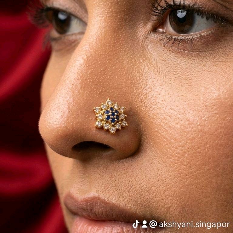 Big flower white and blue nose pin. Indian screw type. Not 916 gold.