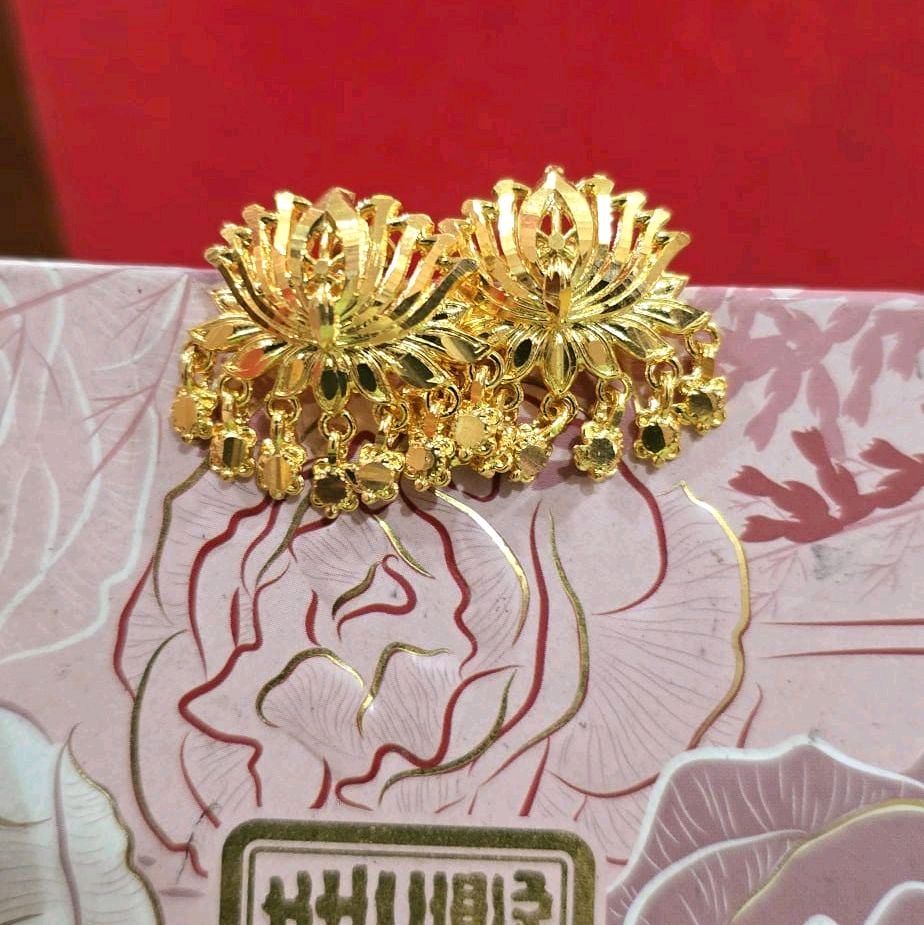 1 inch length lotus diamond cut earrings with smgold plated dongles. Not 916 gold. Indian screw type