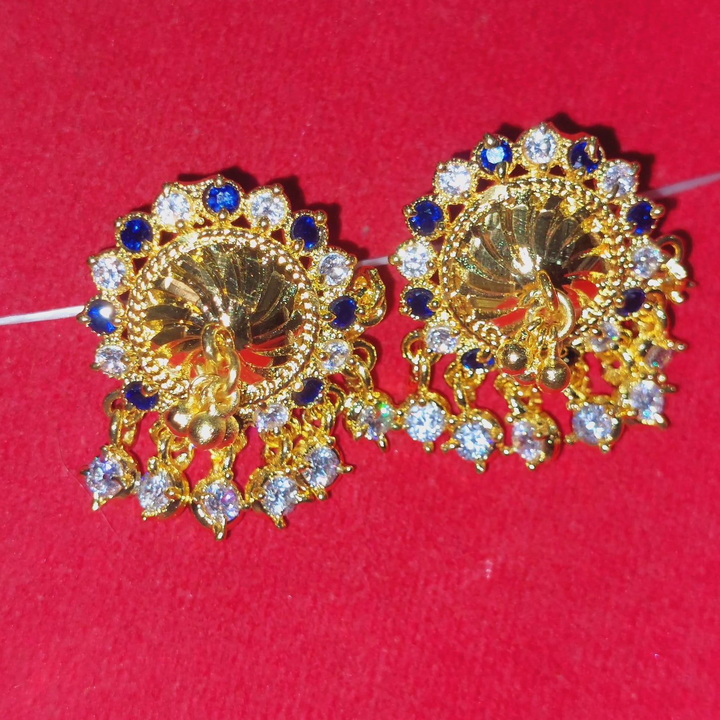 Navy blue and white mossanite stones earrings. Not 916 gold