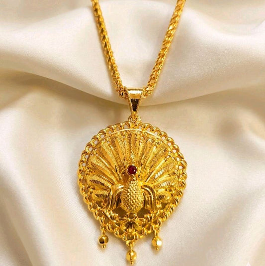 28 inches diamond cut chain with removable peacock locket. NOT 916 GOLD. CODE P989