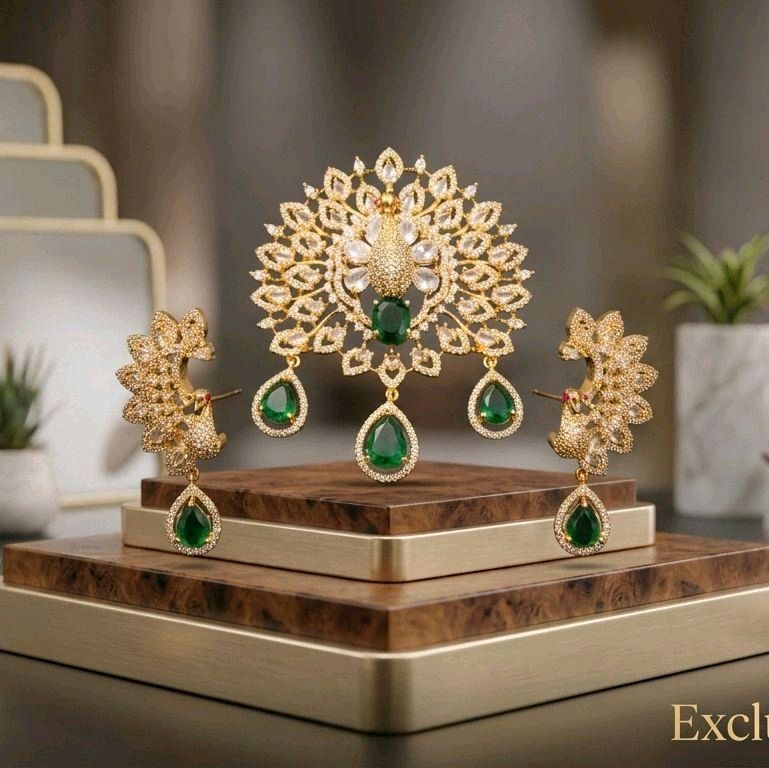 1.5 inch faux emerald embedded with white stones pendent 1.2 inch  earrings and pendent set. Chain not included