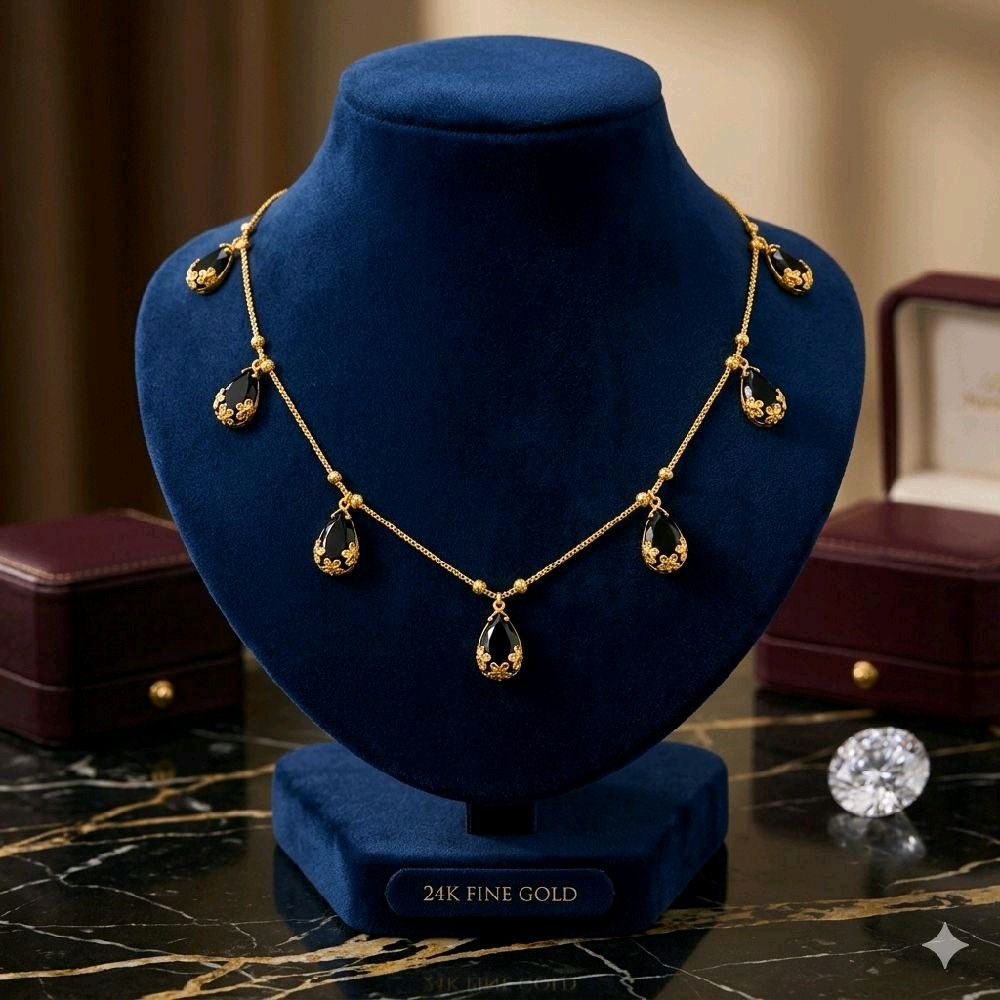 Black raindrops crystal necklace. Length 18 inches. Not 916 gold. Function wear type of jewellery