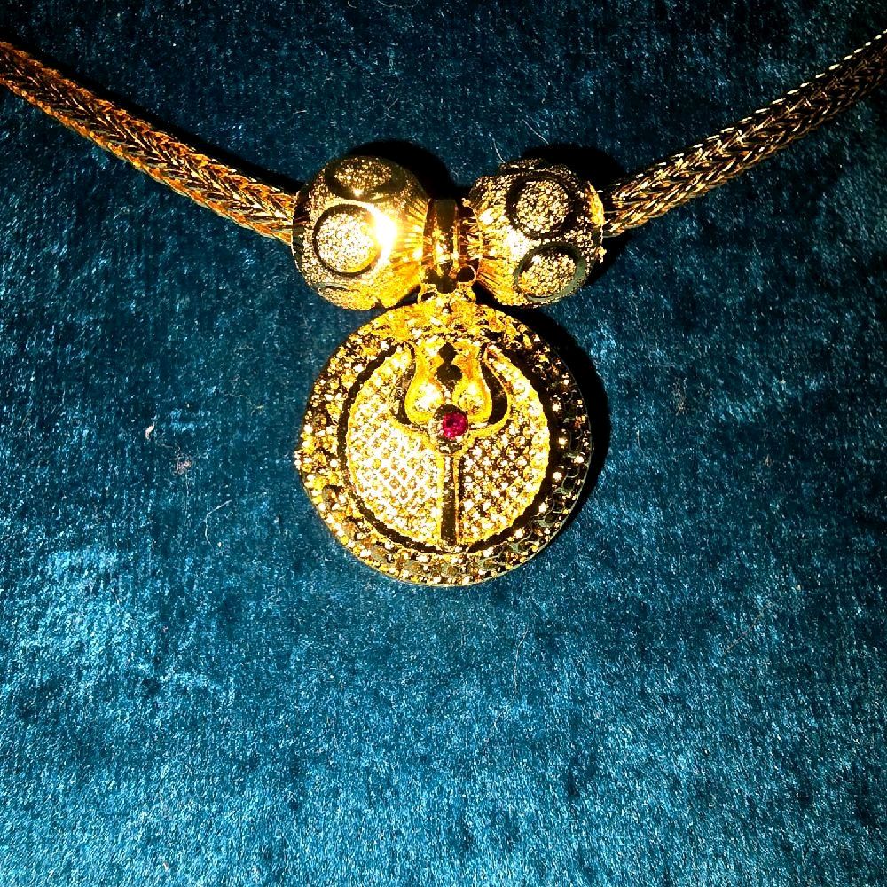 Removable trisul locket with ceylonese chain and diamond cut balls. Not 916 gold
